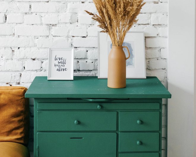 green-dresser-with-flowers